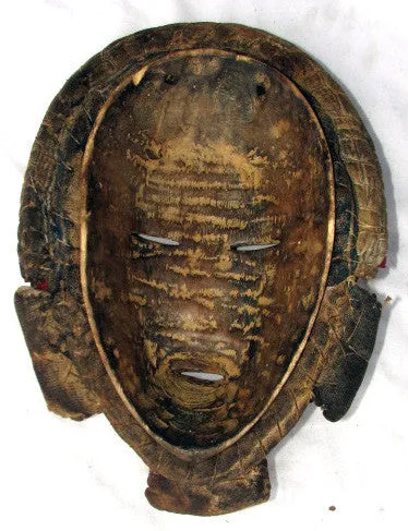 Dan Bagle Mask with Cowries and Red Cloth